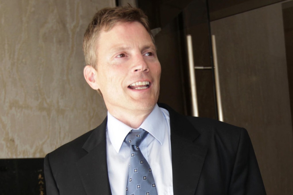 Mr Scott Henderson (pictured) yesterday asked the court to discharge the worldwide injunction and his lawyer claimed that he has returned his Hong Kong identity card.