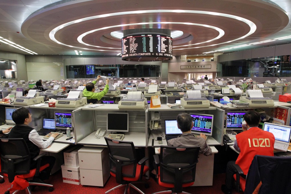 The city's brokers are struggling because of falling market turnover, lower commission rates and competition. Photo: Edward Wong