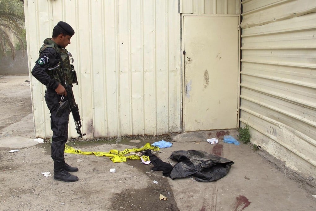 Blood stains the ground at the scene of the attack. Photo: Reuters