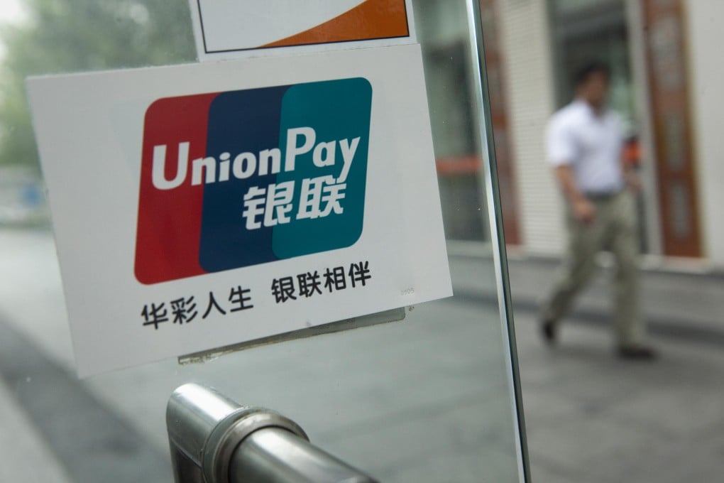 American Express has a card that operates on the US company's network and is not routed via China UnionPay. Photo: Bloomberg