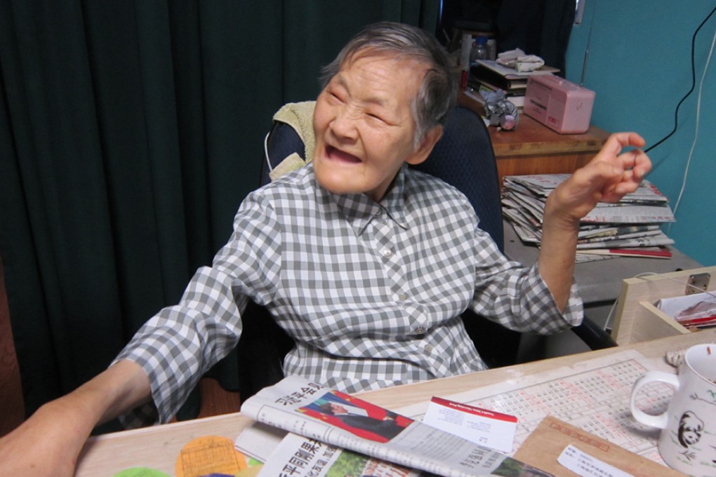 Lu has had cerebral palsy since birth, and uses massage to help children with the disorder at her facility in Shanghai. Photo: Alice Yan