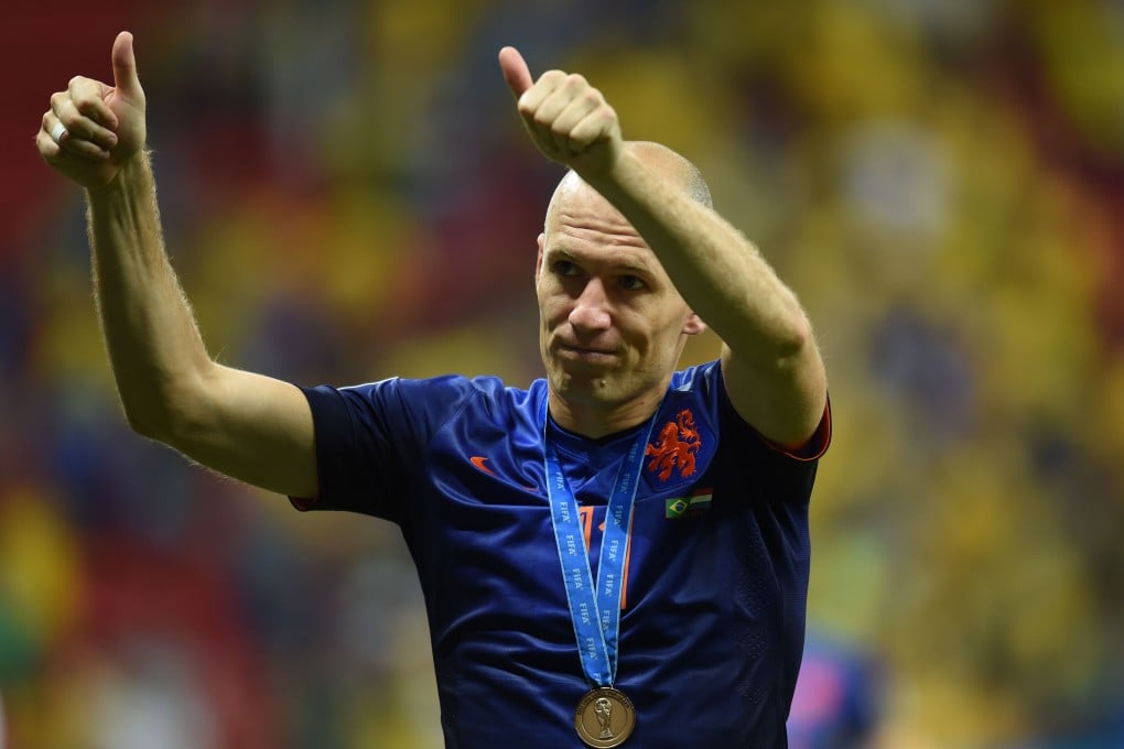 Arjen Robben celebrates with his bronze medal. Photo: AFP