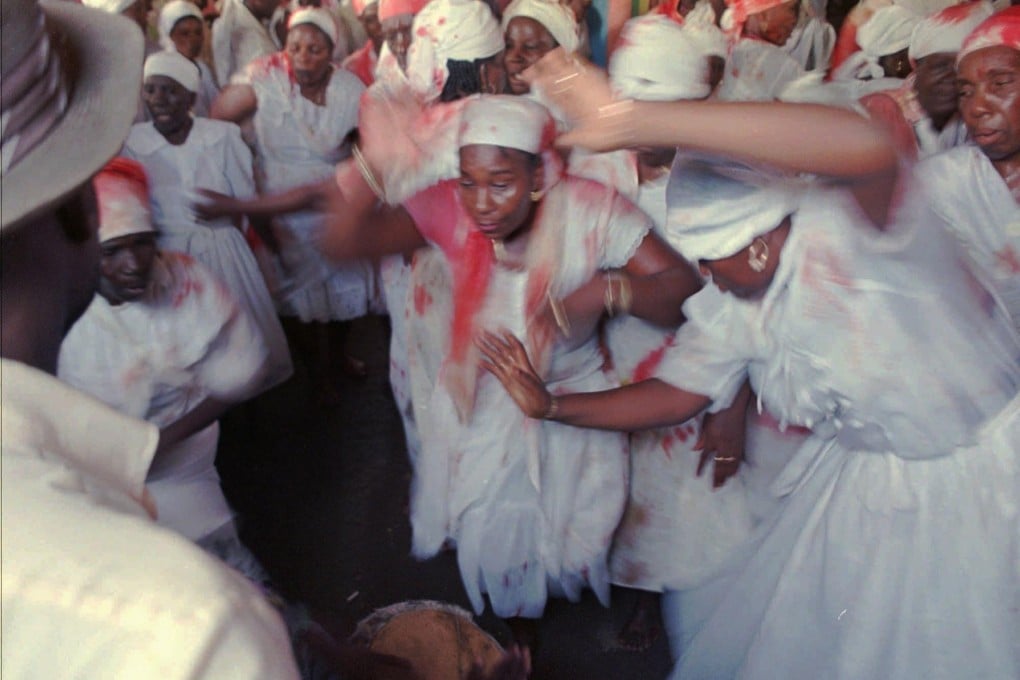 Many Haitians are voodooist and Catholic. Photo: AP