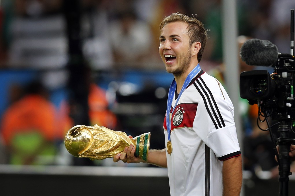 Goetze with the World Cup. Photo: AP