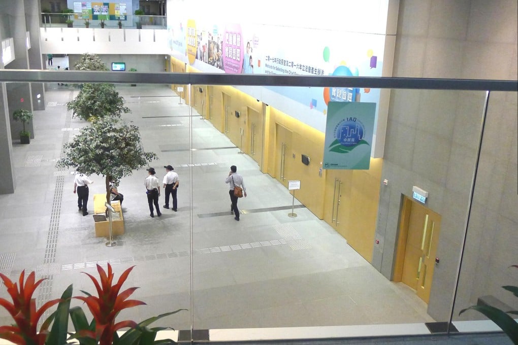 Transparent designs at the central government buildings can leave women wearing skirts vulnerable to peeping Toms, a report says. Photo: SCMP