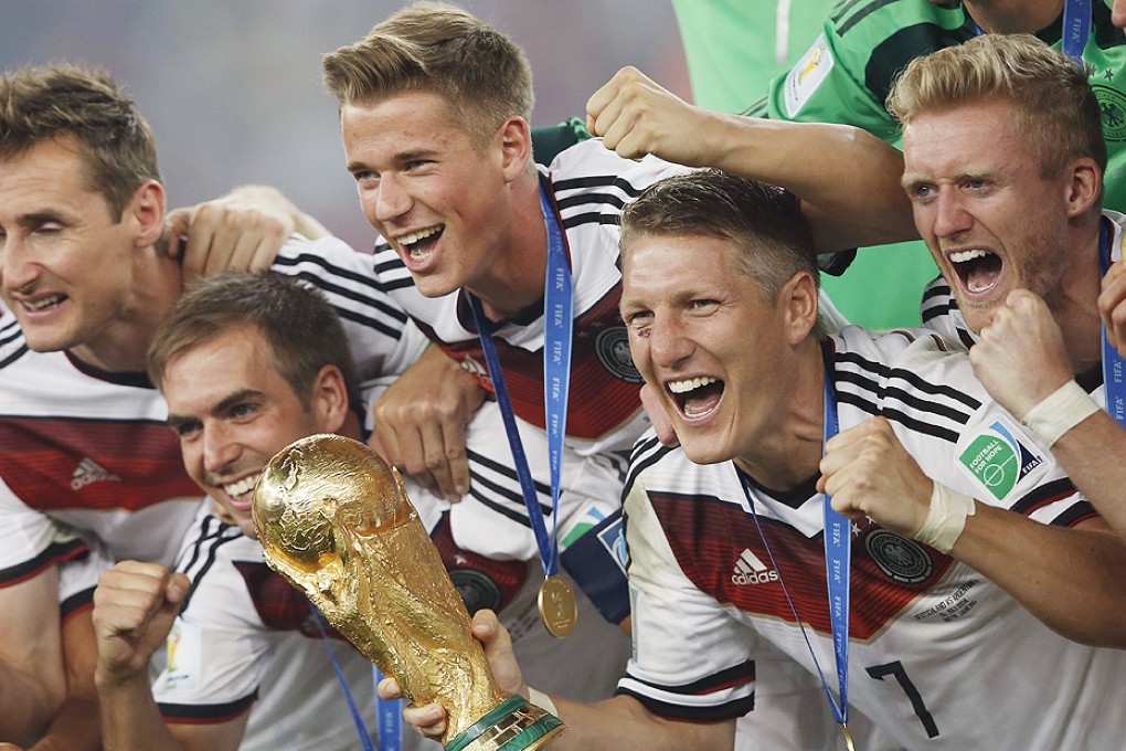 Germany celebrate with the World Cup. Photo: AFP