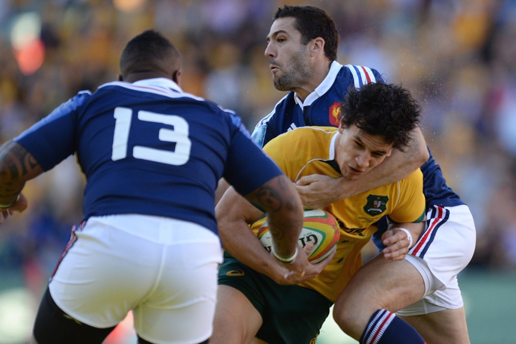 Wallaby Matt Toomua, shown here leading the charge for Australia against France in June, scored a hat-trick of tries for the Brumbies against Western Force on Saturday. Photo: EPA