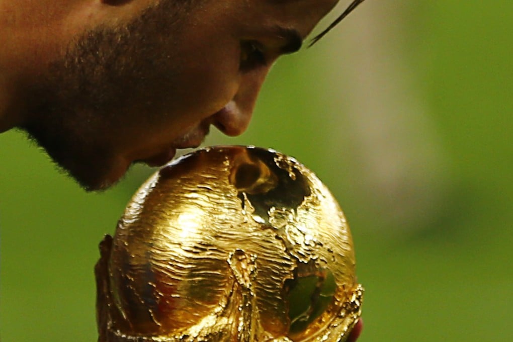 Mario Goetze kisses the trophy. Photo: Reuters