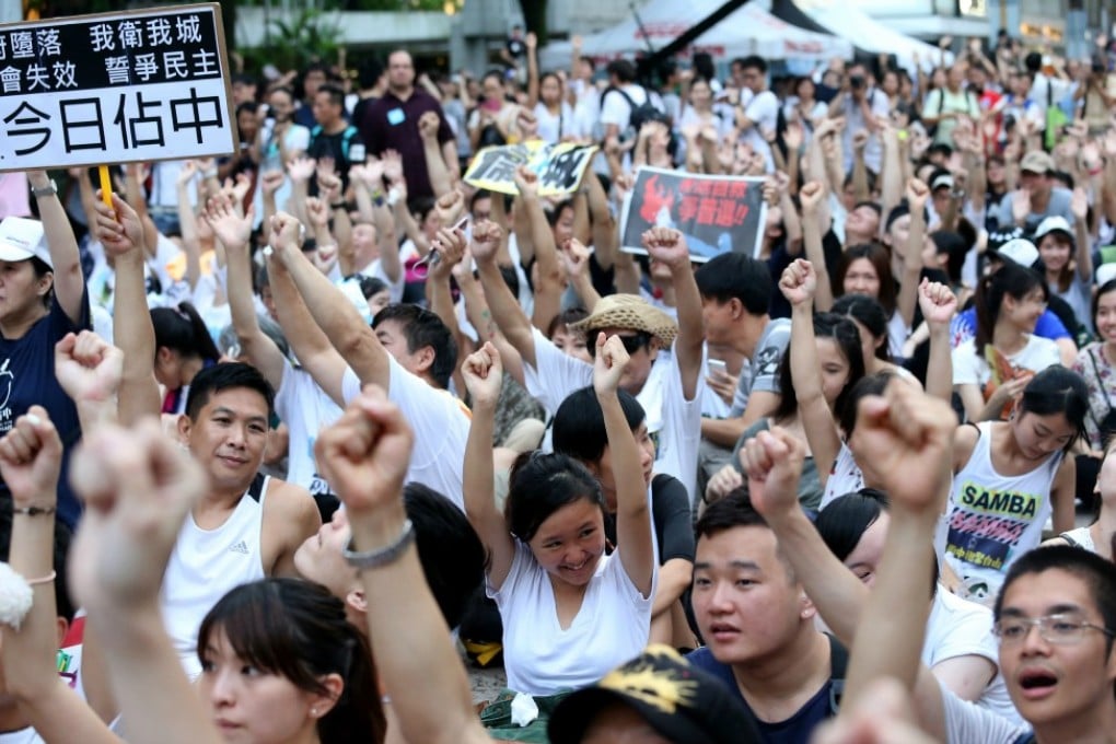 Protesters call for genuine universal suffrage on July 1 this year. Photo: K.Y. Cheng