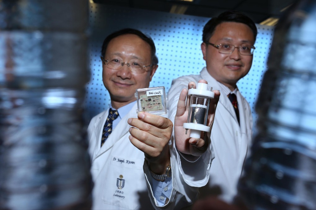 Professor Joseph Kwan (left) and Professor Yeung King-lun with prototypes of the water-disinfection device. Photo: Nora Tam