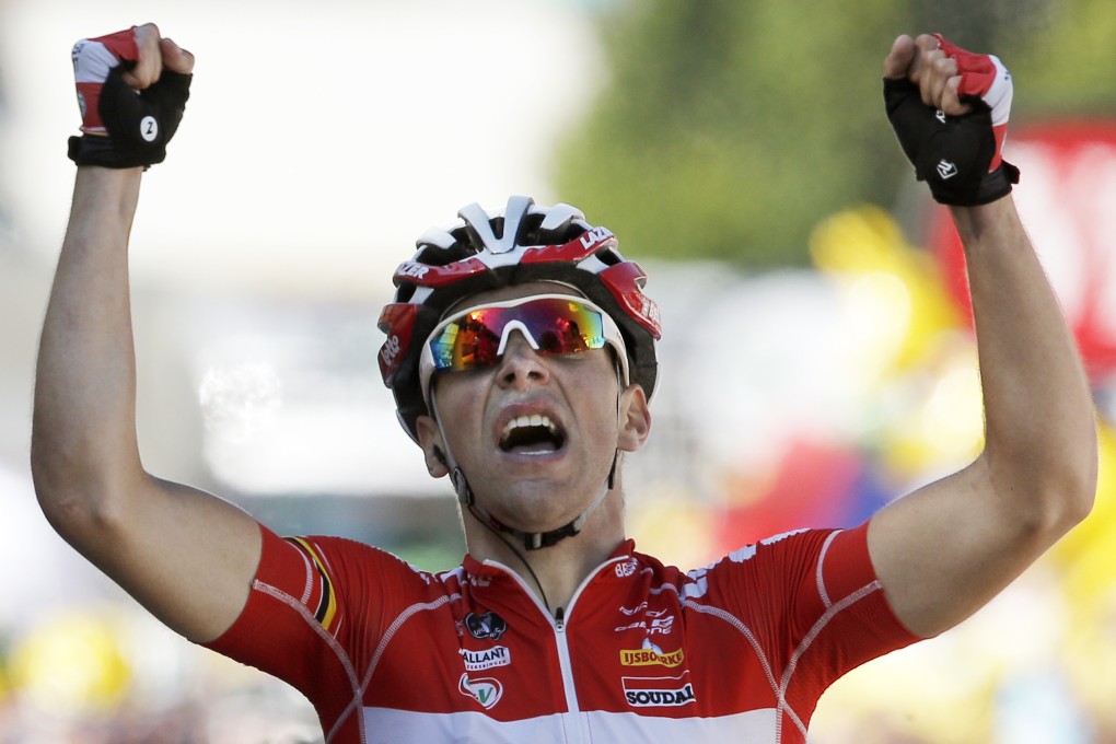 France's Tony Gallopin crosses the finish line to win the eleventh stage of the Tour de France between Besancon and Oyonnax. Photo: AP