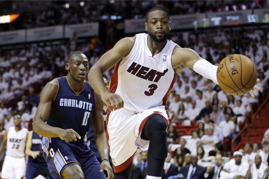 Miami's Dwyane Wade signs a new two year contract with an NBA franchise he has spent his entire career with, clinching three championships. Photo: AP