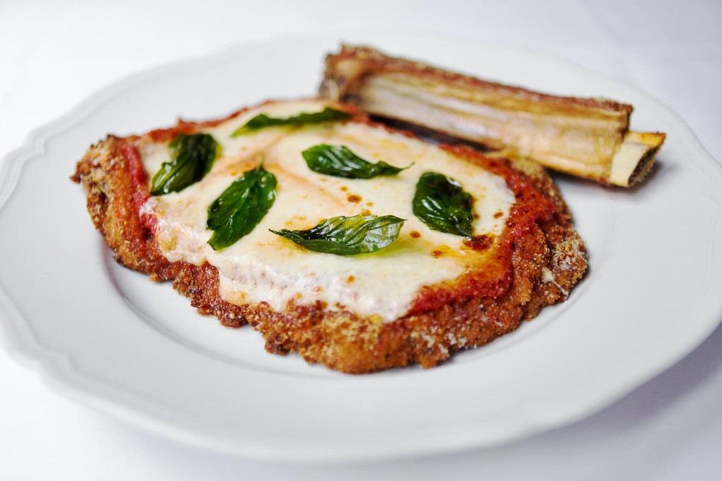 Veal parmesan with "gravy". Photo: Bruce Yan