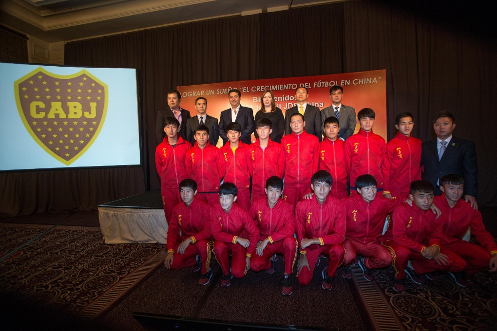 Chinese junior players and officials at a ceremony in Buenos Aires to launch a new training programme by Boca Juniors. Photo: Xinhua