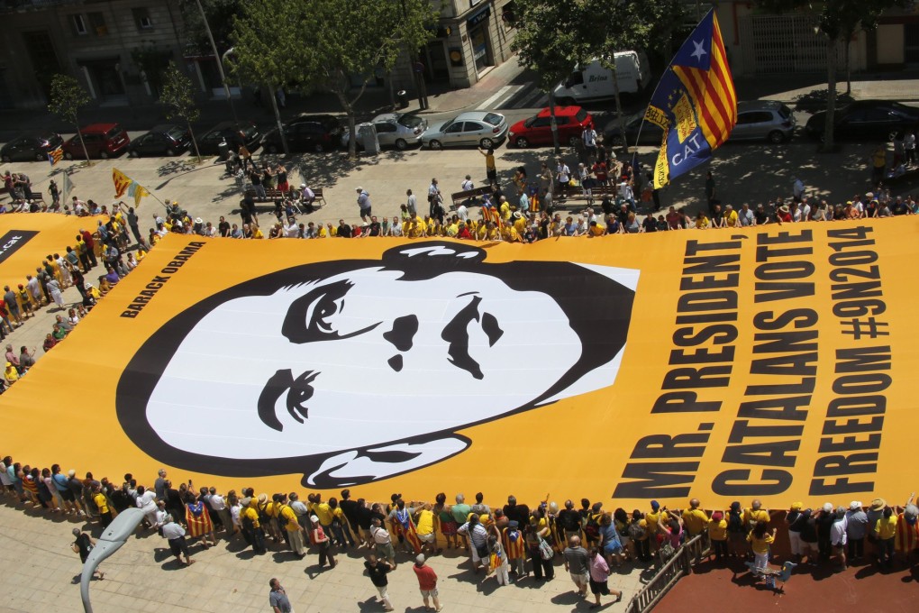 Protesters in Badalona, in Catalonia, eastern Spain, demand to hold a vote on independence for Catalonia. Photo: Reuters