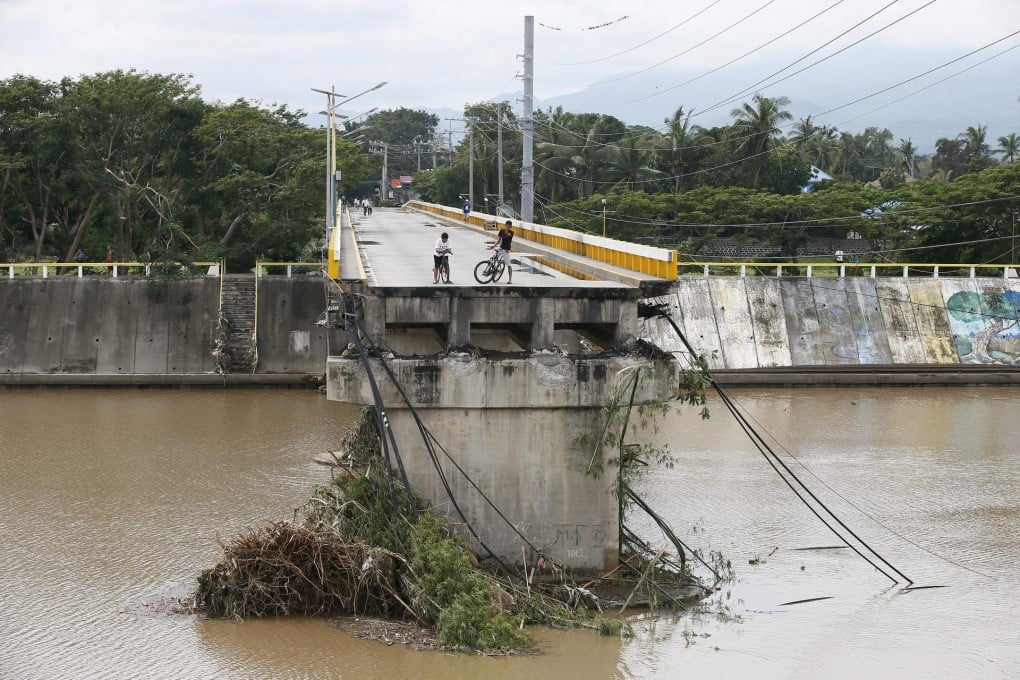 A bridge wrecked by the typhoon in Batangas City. Photo: EPA