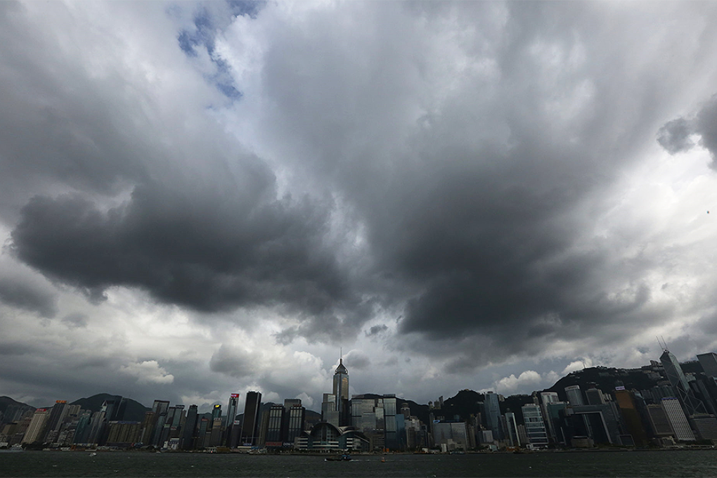 Dark clouds loom over Victoria Harbour as Typhoon Rammasun approaches Hong Kong. Photo: Felix Wong
