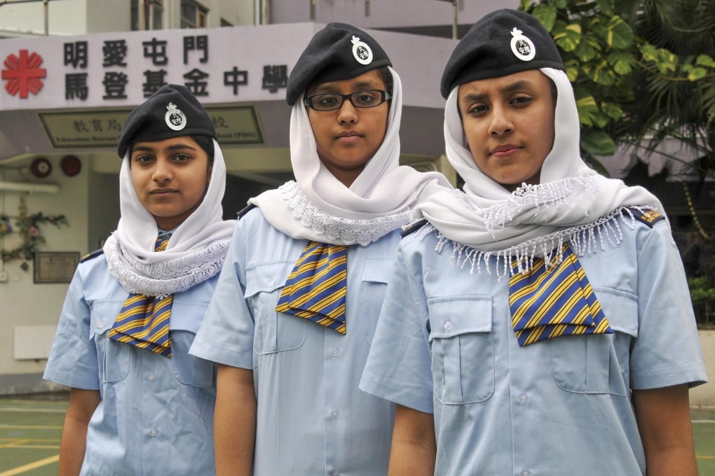 Students at Caritas Tuen Mun Marden Foundation Secondary School wear headscarves.