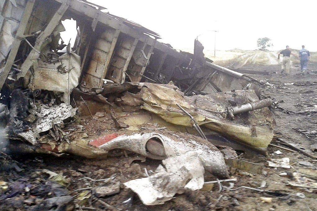 Wreckage from the Malaysia Airlines passenger plane seen near the village near Grabovo in Ukraine yesterday.Photos: Reuters, AFP