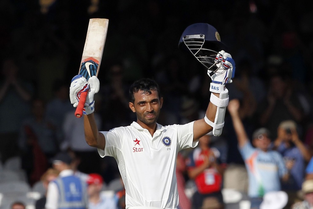 India's Ajinkya Rahane acknowledges the crowd after reaching his  century. Photo: AFP