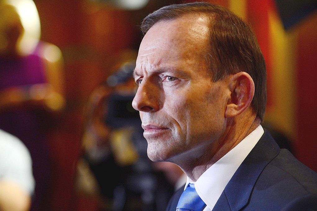 Tony Abbott attends a news conference in Sydney, Australia, on Thursday. Photo: Bloomberg
