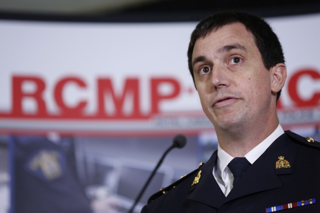 Royal Canadian Mounted Police assistant commissioner Gilles Michaud takes part in a news conference on July 17. The RCMP have laid 31 charges against Canadian senator Mike Duffy. Photo: Reuters