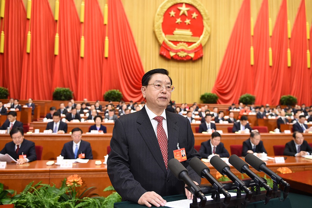 Zhang Dejiang, chairman of the Standing Committee of the National People''s Congress, addresses the second plenary meeting at the Great Hall of the People in March. Photo: Xinhua