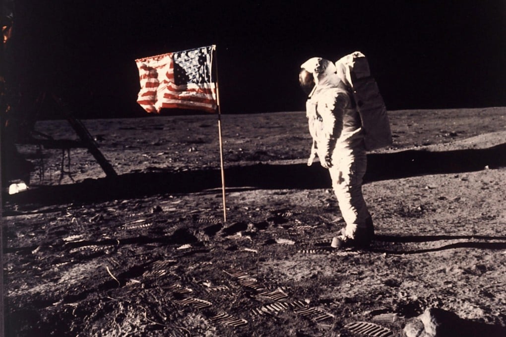 Buzz Aldrin stands beside the US flag on the moon. Photo: AP