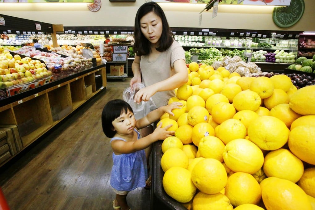 Shoppers enjoy the Asian comforts of Orange County. Photo: MCT