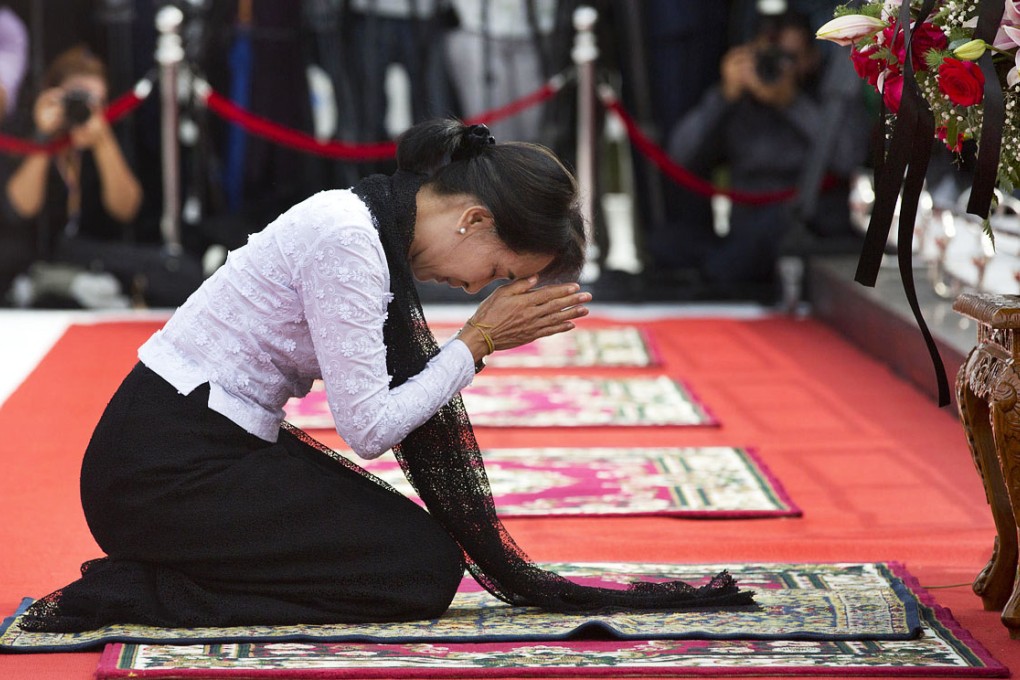 Suu Kyi believes "she has been born to rule". Photo: AP