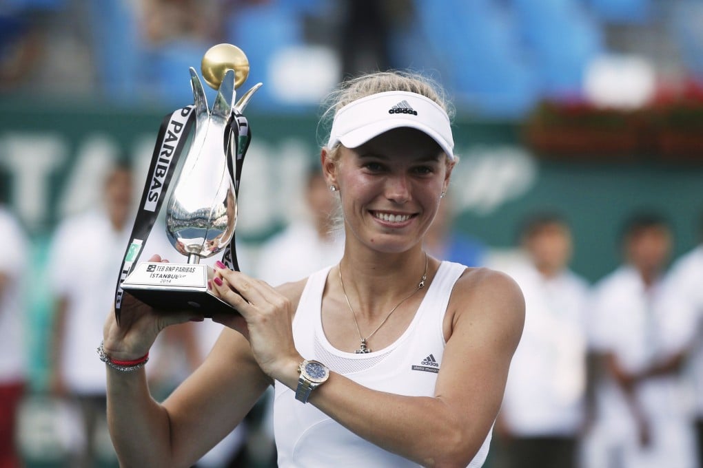 Caroline Wozniacki of Denmark celebrates with the trophy after her victory in the Istanbul Cup women’s singles final. Photo: Reuters