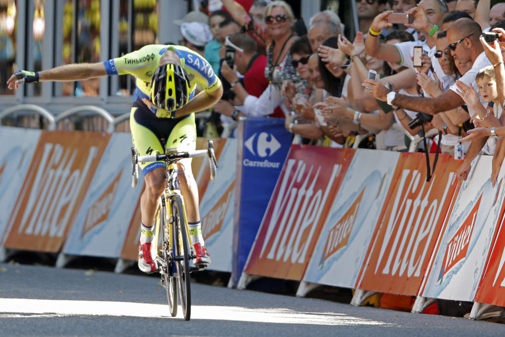 Australia's Michael Rogers bows for cheering spectators as he wins the 16th stage of the Tour de France between Carcassonne and Bagneres-de-Luchon. Photo: AP