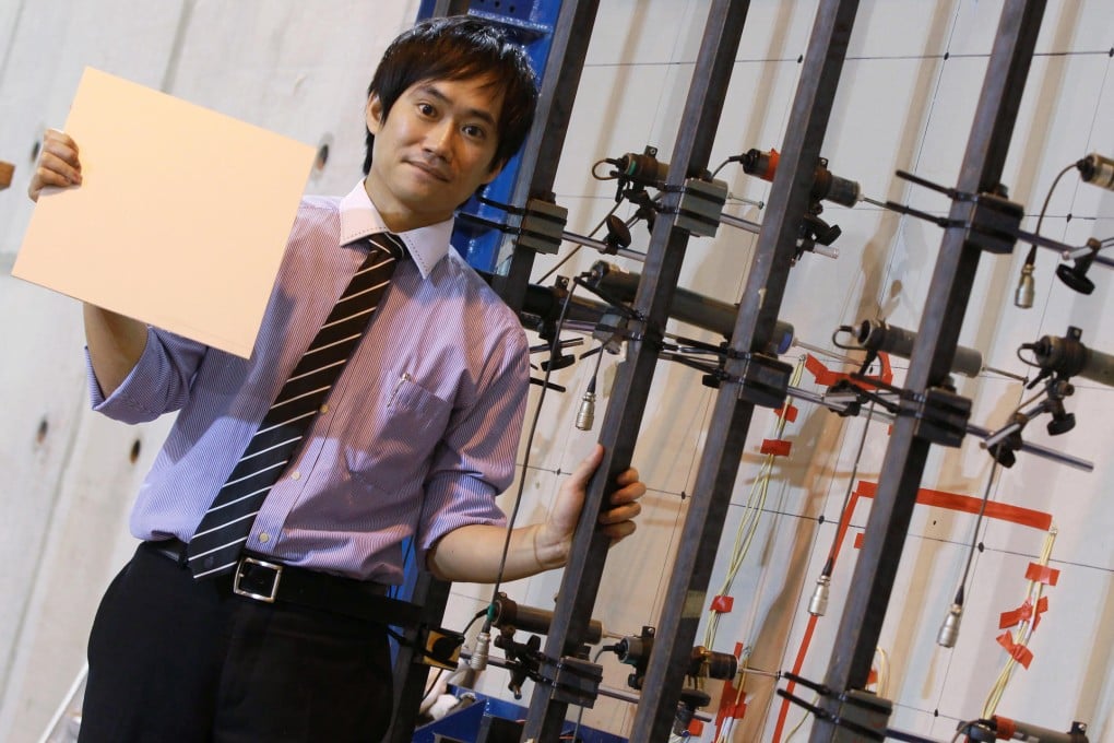 Ben Chan, of the University of Science and Technology, shows off the new fibre-reinforced aluminium. Photo: Edward Wong