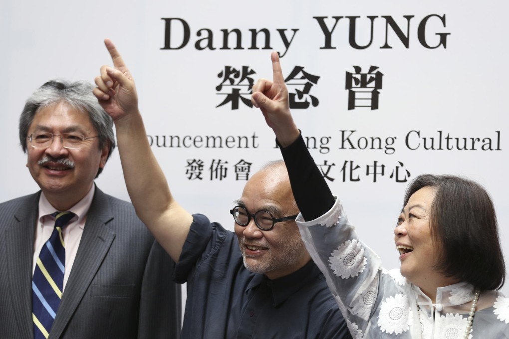 A beaming Danny Yung with Anna Wu Hung-yuk, of theatre group Zuni Icosahedron, at the award announcement yesterday. Photo: Nora Tam