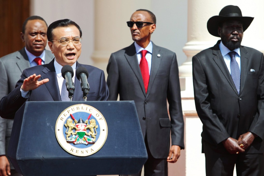 Chinese Prime Minister Li Keqiang delivers a speech next to Kenyan President Uhuru Kenyatta (left), Rwandan President Paul Kagame (second right) and South Sudan's President Salva Kiir (right) at a news conference in Nairobi. Photo: EPA