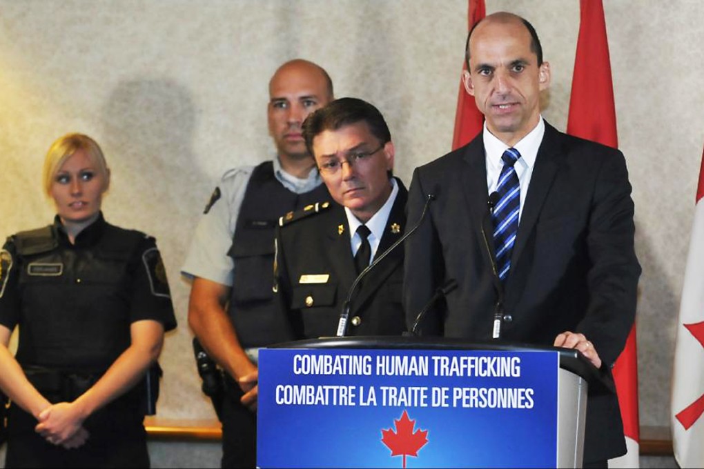 Canada's Public Safety Minister Steven Blaney (right) made the announcement on Tuesday in Hamilton, Ontario where the criminal ring operated. Photo: Screenshot via Twitter