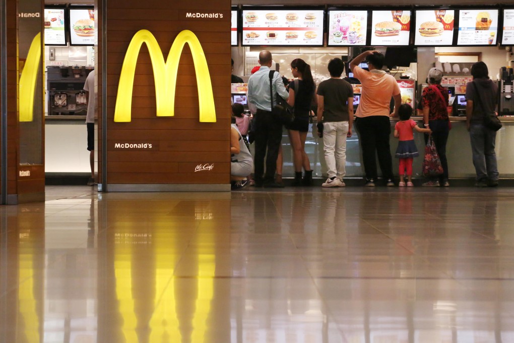 Customers place their orders at a McDonald's branch in Shatin yesterday. Photo: Felix Wong