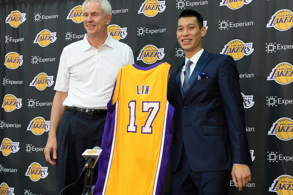 Los Angeles Lakers general manager Mitch Kupchak introduces Jeremy Lin during a press conference. Photo: USA Today