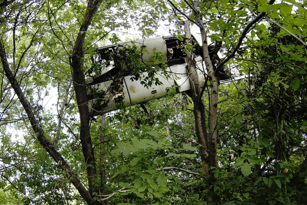 A week after flight MH17 was shot down, wreckage from the Boeing 777 is strewn over a wide area, such as overhead lockers in trees. Photo: AP