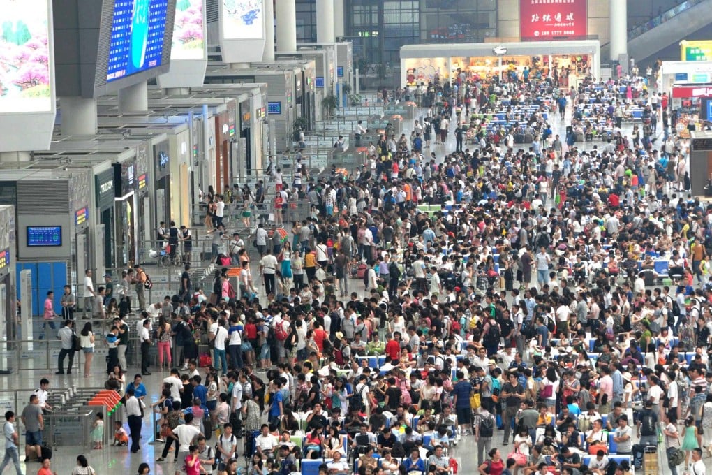 Passengers transferring from Shanghai's Hongqiao International Airport crowd the Hongqiao Railway Station waiting hall. Photo: ImagineChina