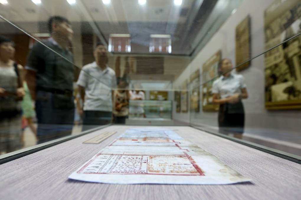 People visit the file and photo exhibition marking the 120th anniversary of the First Sino-Japanese War, in Shengyang. Photo: Xinhua