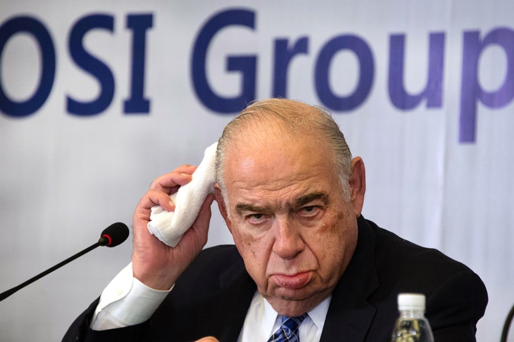 Sheldon Levin, CEO of the OSI Group, gestures as he attends a press conference over the recent expired meat scandal in Shanghai today. Photo: AFP