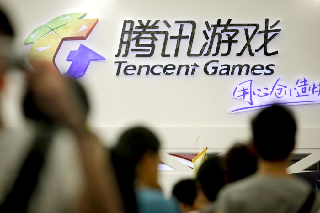 Visitors at the Tencent Games booth at the China Digital Entertainment Expo and Conference in Shanghai. Photo: Bloomberg