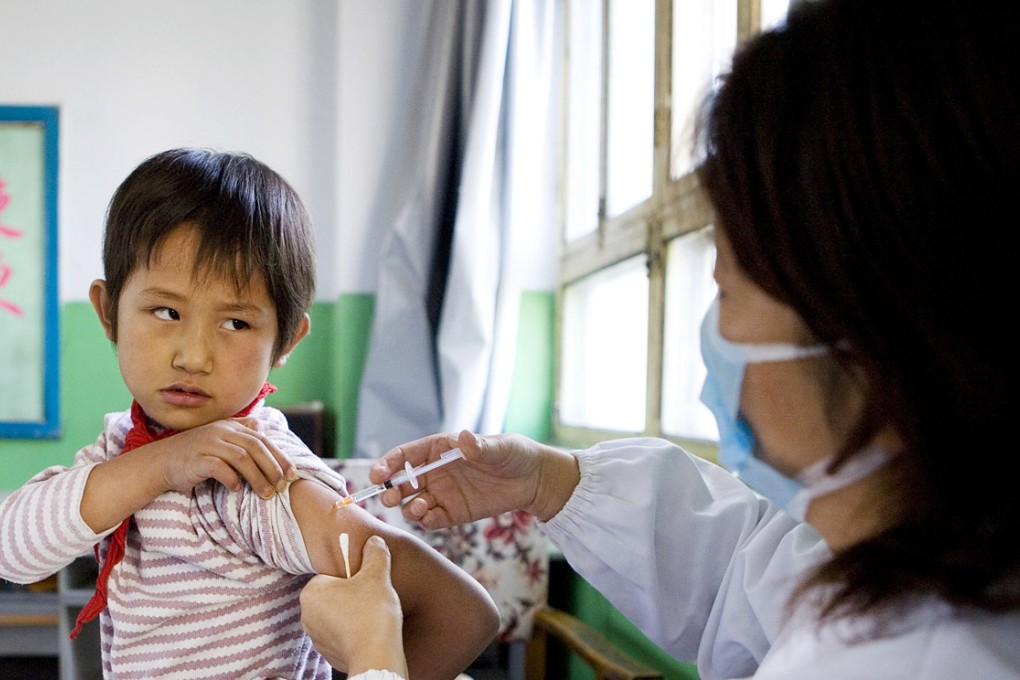 A child receives an injection of the Hepatitis B vaccine in Qinghai, China.