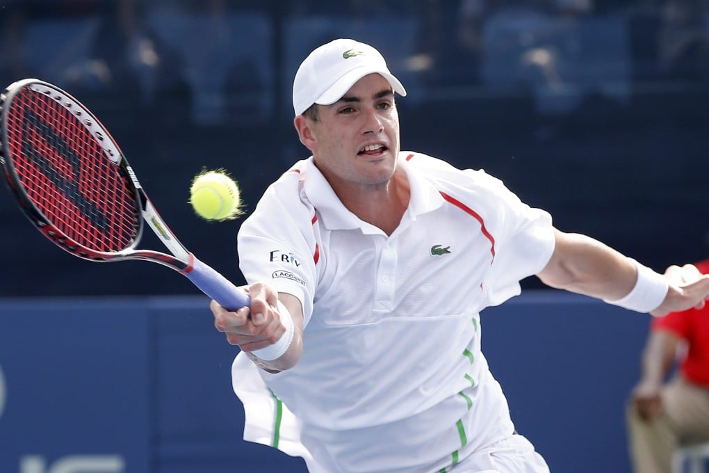 John Isner of the US returns the ball to Dudi Sela of Israel during their men's singles final at the BB&T Atlanta Open in Georgia. Photo: EPA