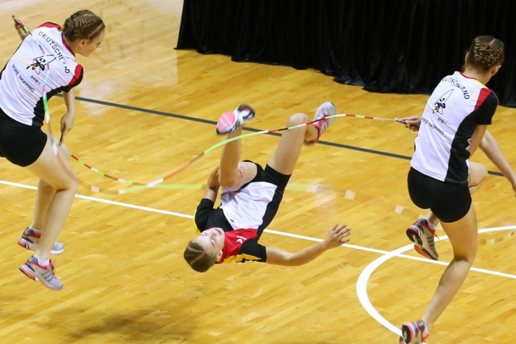 High-energy: the German girls' team compete at the MacPherson Stadium yesterday. Photo: Felix Wong