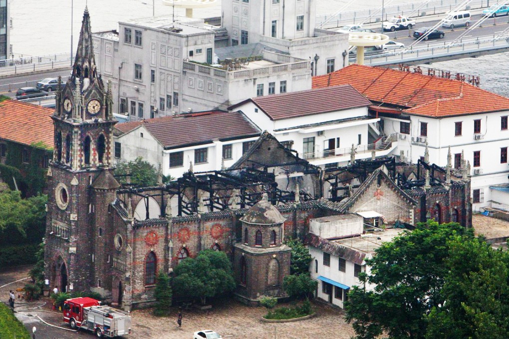 The fire took out the roof and interior of Ningbo's Jiangbei Cathedral, which was built by a French bishop in 1872, making it one of the mainland's oldest. Photo: AFP