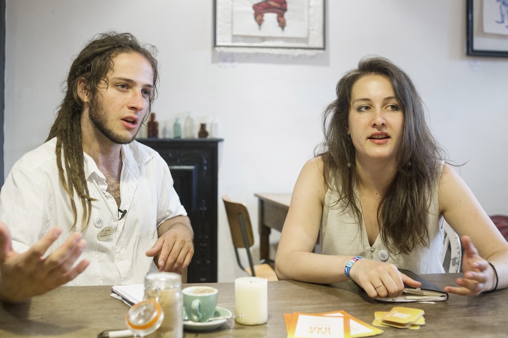 Polly Akhurst, right, and David Blackwell, co-founders of Talk To Me London. Photo: AP