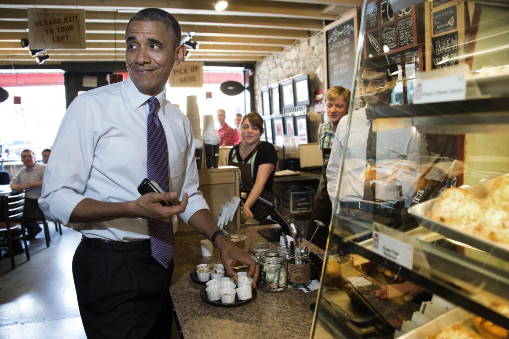 President Barack Obama finds his reception at this Missouri café far more pleasant than in the House of Representatives.Photo: AFP