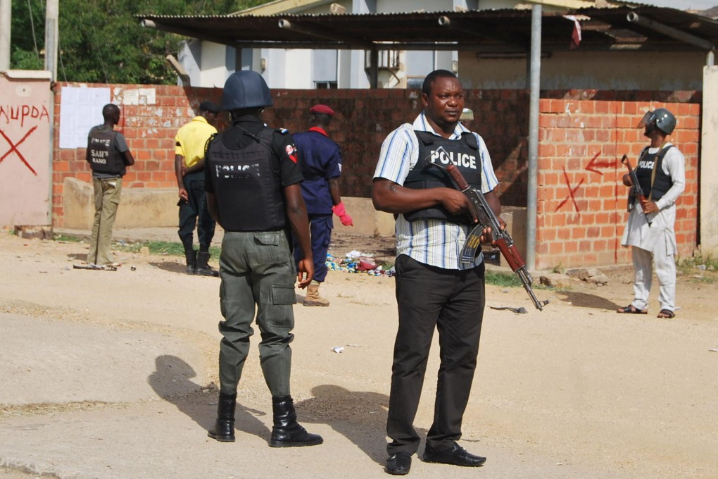 Police at a school that was hit.